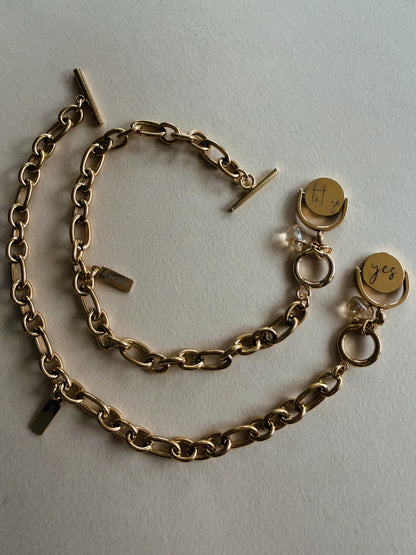 Intuitive bracelet with reversible pendant