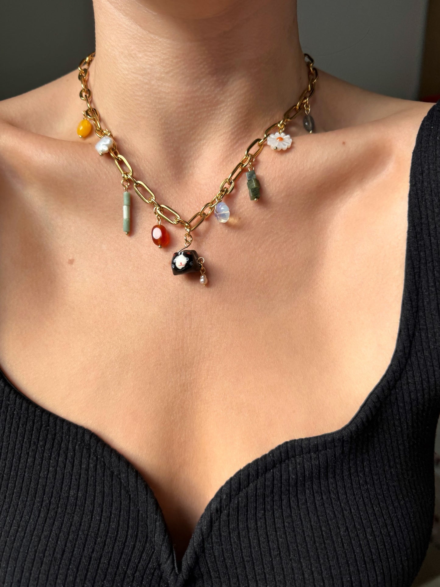 Gold multi charm necklace