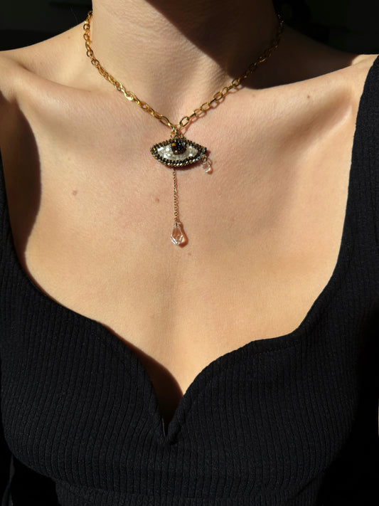 Collier pendentif oeil brodé