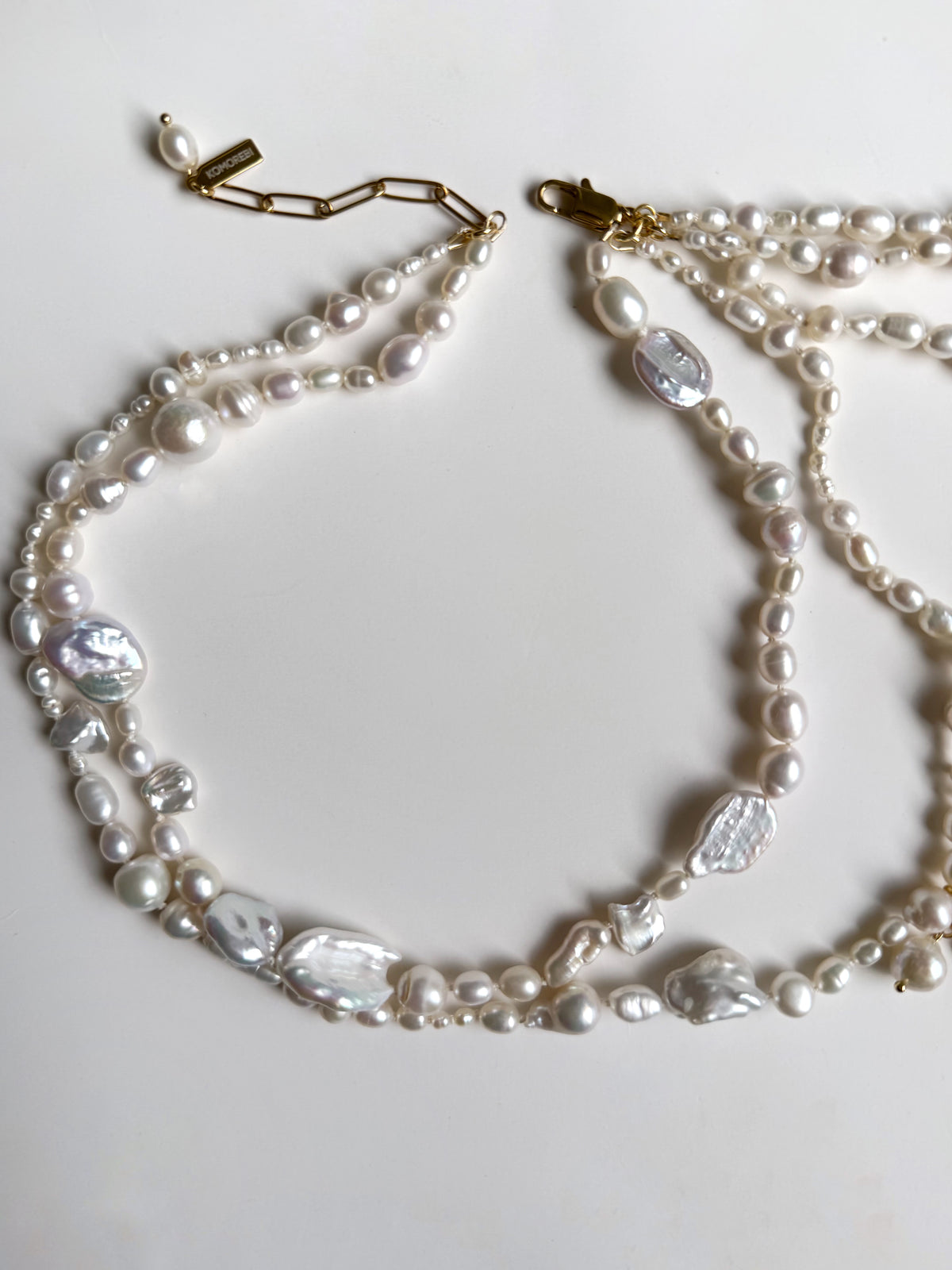 The pearl shoulder necklace