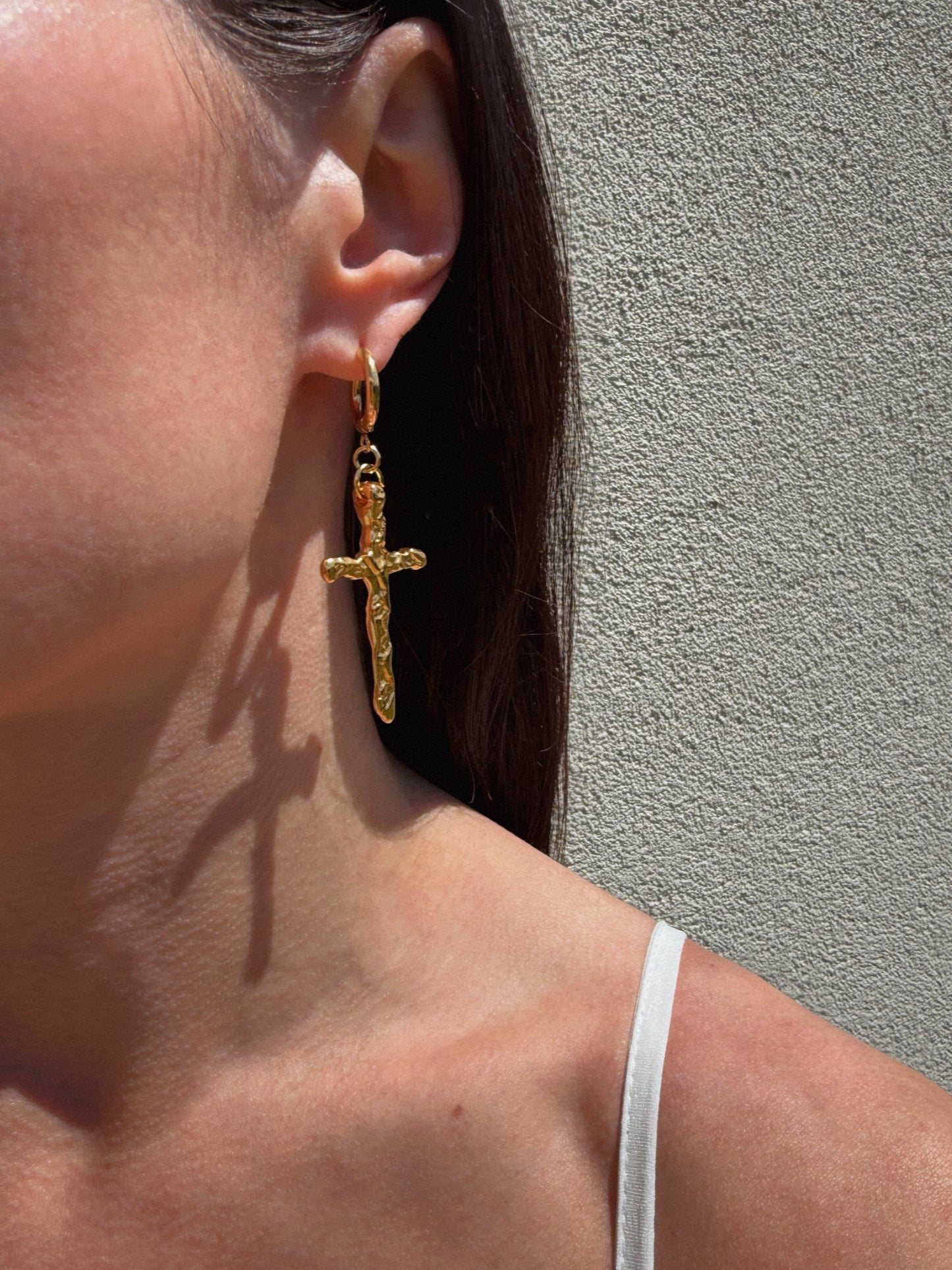 Mismatched cross earrings