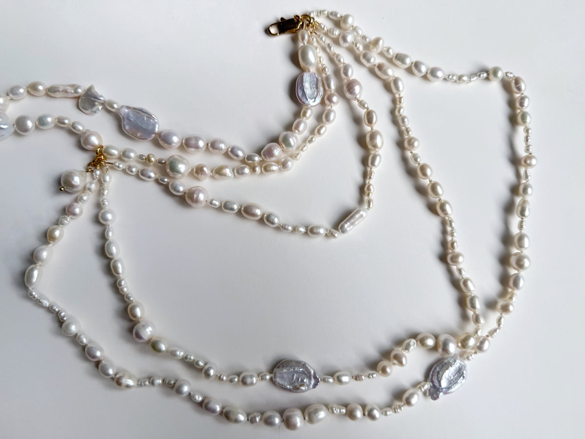 The pearl shoulder necklace