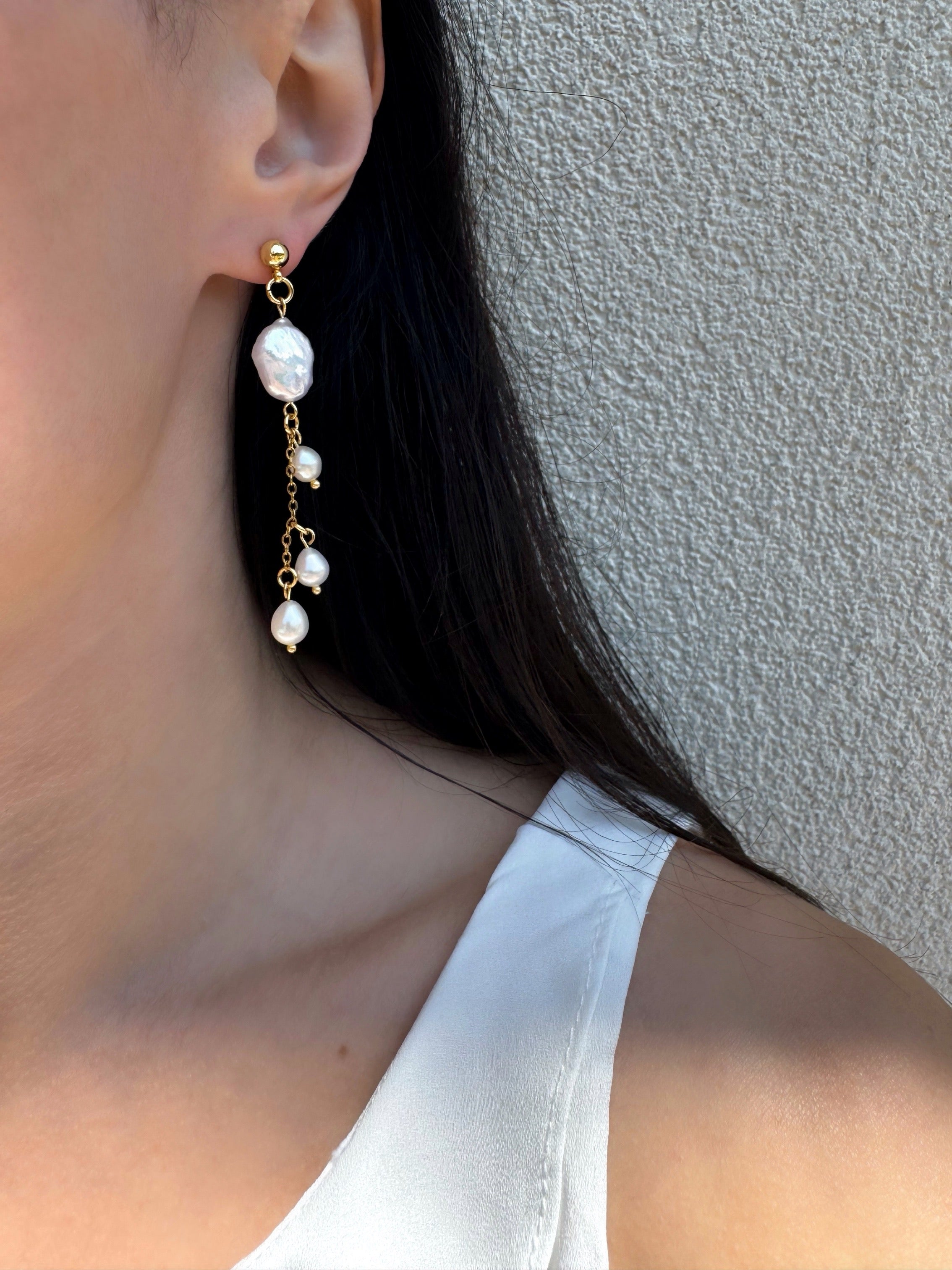 Boucles d’oreilles pendantes de perles d’eau douce
