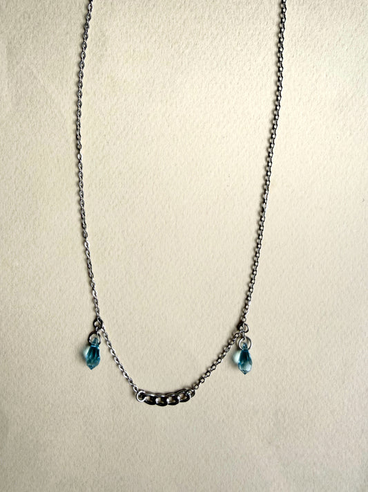 Chaîne de visage argentée avec pendentifs gouttes