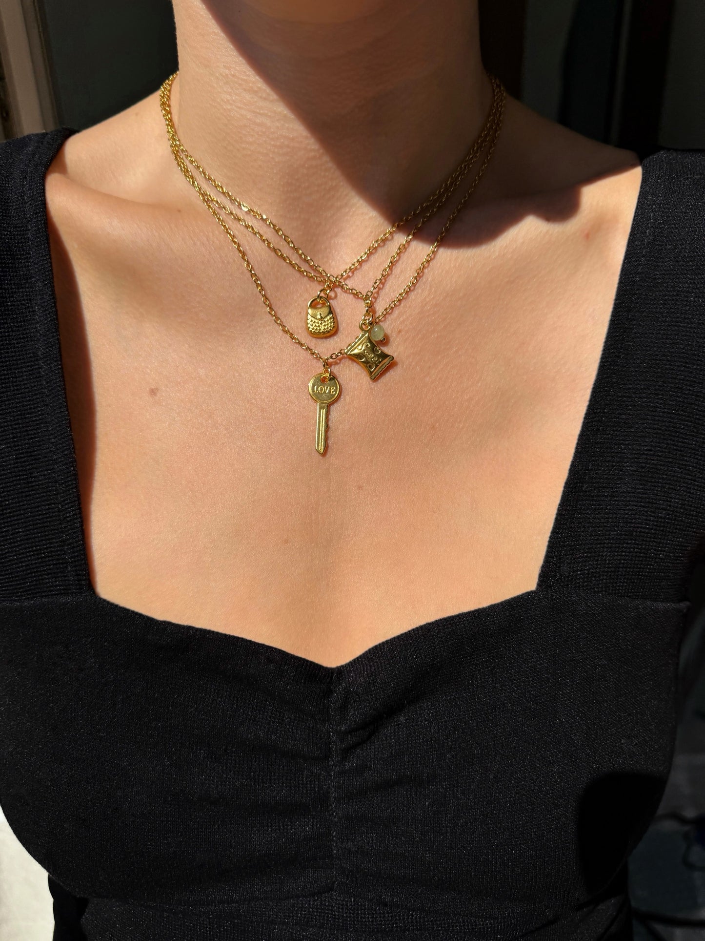 Collier multi charms doré