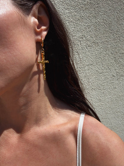 Mismatched cross earrings