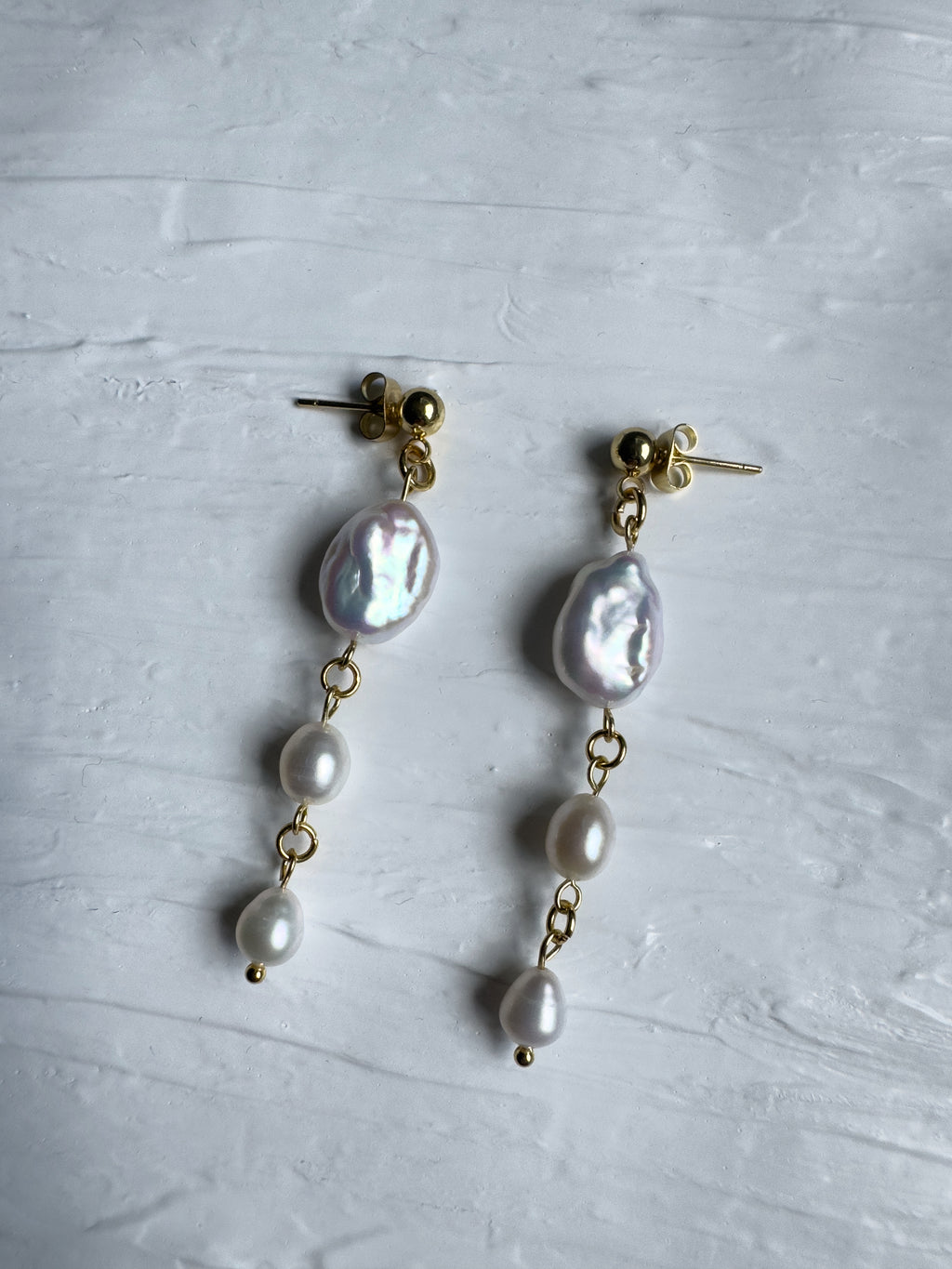 Boucles d’oreilles pendantes de perles d’eau douce