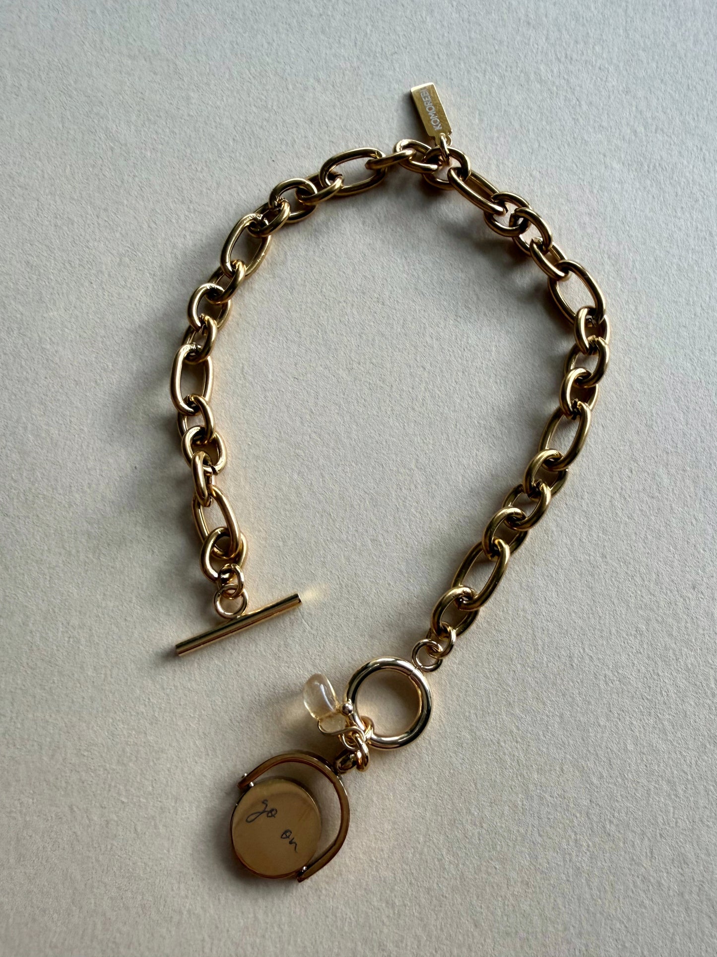 Intuitive bracelet with reversible pendant