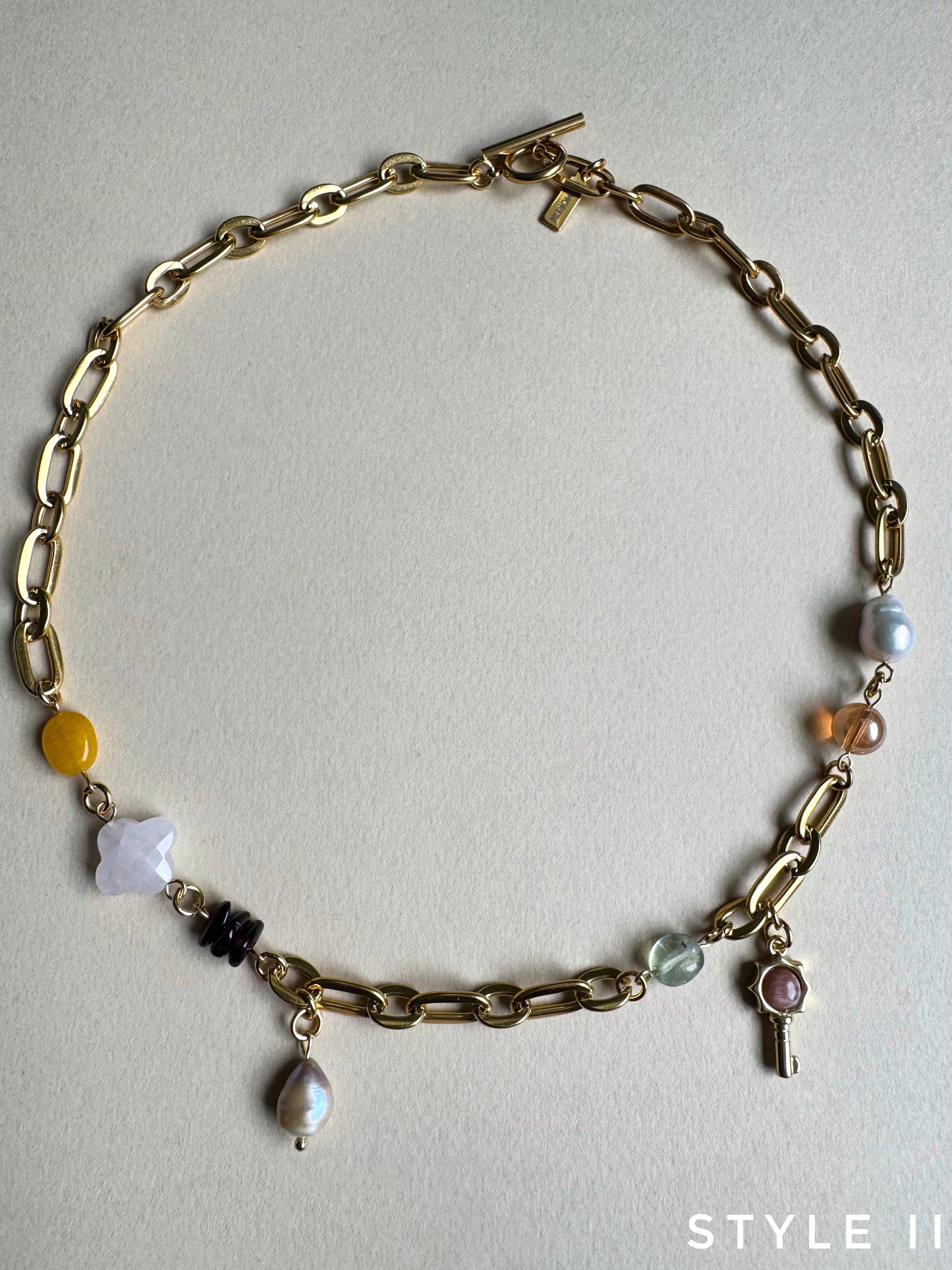 Collier multi charms doré