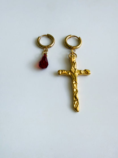 Mismatched cross earrings