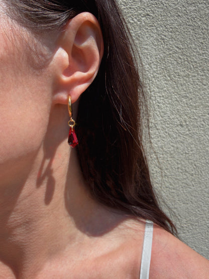 Mismatched cross earrings