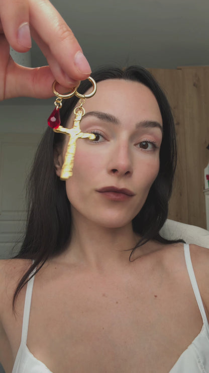 Mismatched cross earrings
